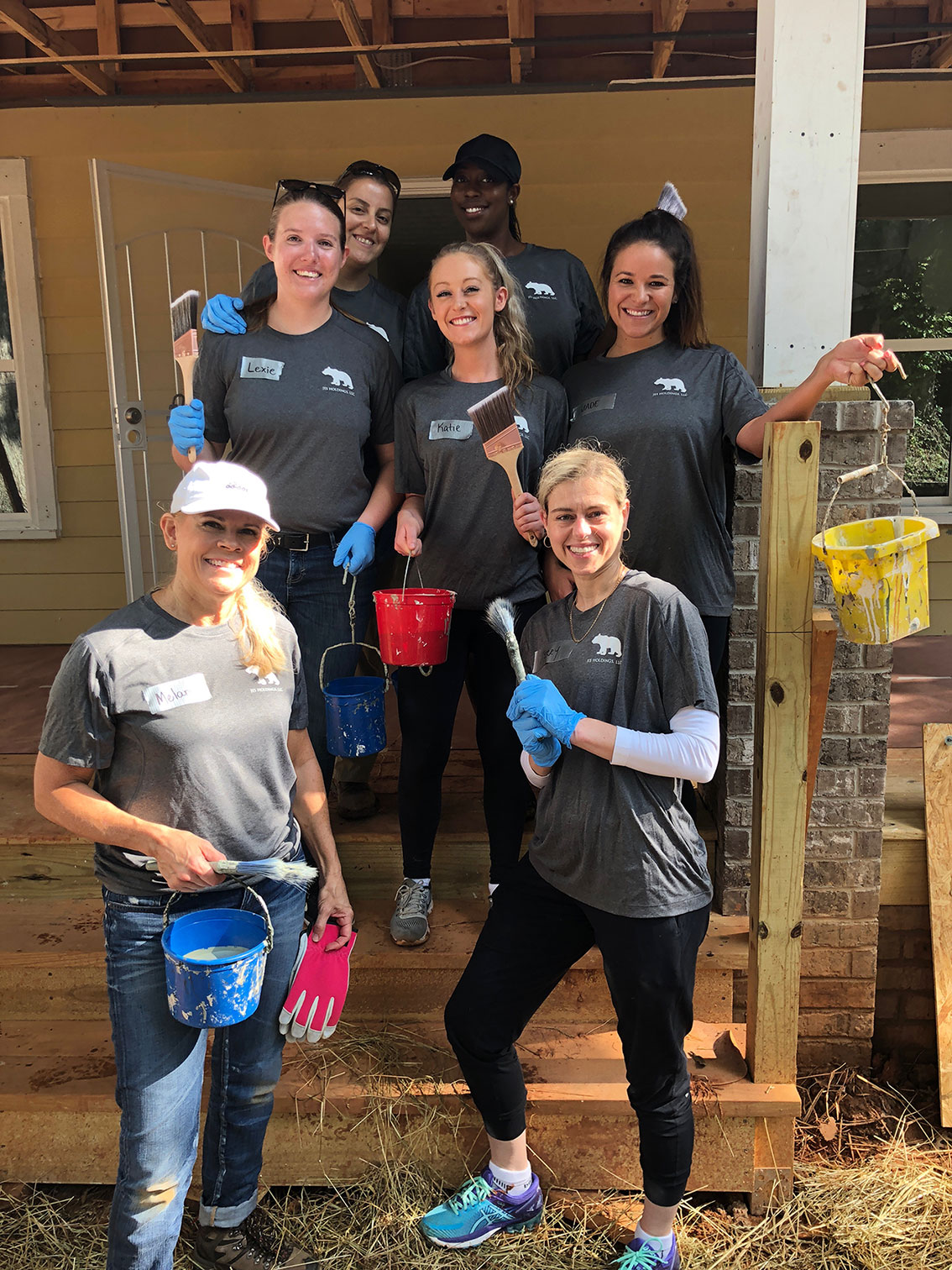 Women standing together with tools